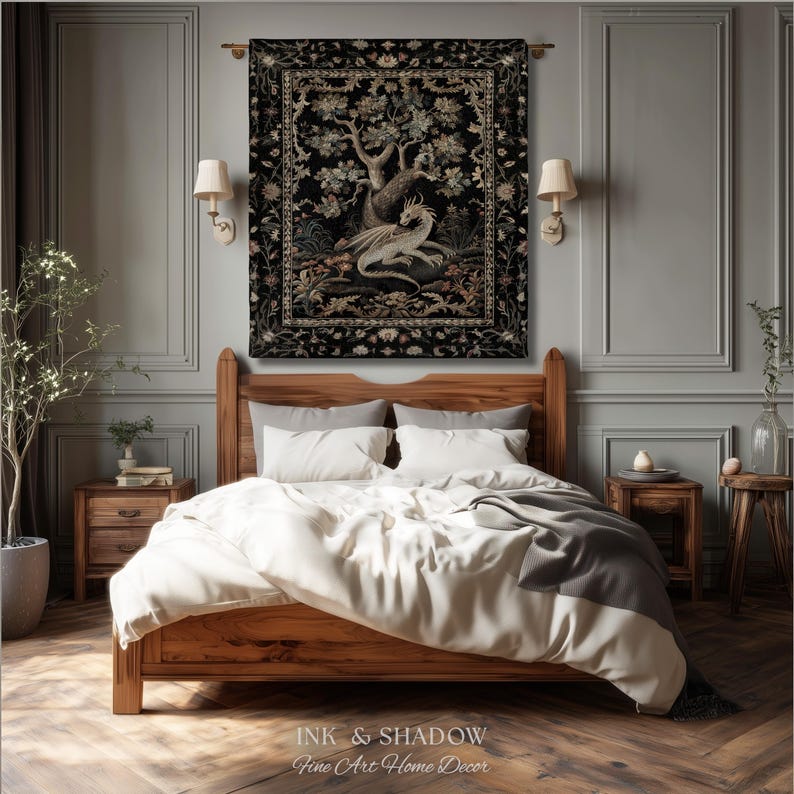 May include: A rectangular wall tapestry featuring a central illustration of a white dragon resting beneath a large tree, surrounded by a detailed floral border in shades of black, gold, and cream, hanging above a wooden bed frame.