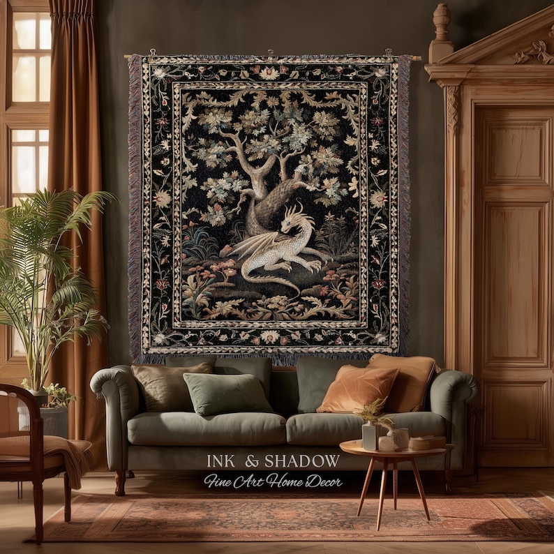 May include: A rectangular woven wall tapestry featuring a central illustration of a white dragon resting beneath a large tree, surrounded by a detailed floral border on a black background, finished with fringed edges along the sides.