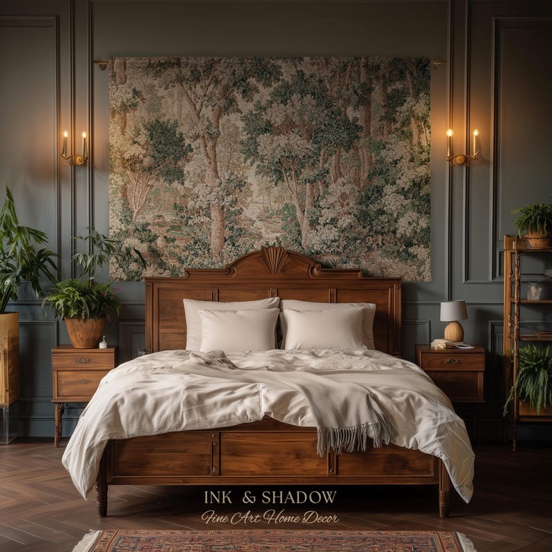 May include: A bedroom scene featuring a wooden bed with cream-colored bedding and a forest tapestry. The room has dark green walls, two bedside tables, and a wooden shelf with plants. The text "INK & SHADOW Fine Art Home Decor" is at the bottom.