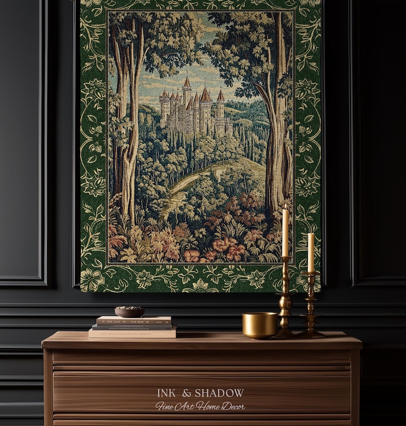 May include: A rectangular wall tapestry featuring a detailed woven scene of a castle nestled within a dense forest, framed by a dark green border with gold floral patterns. The artwork depicts tall trees, rolling hills, and a stone castle.