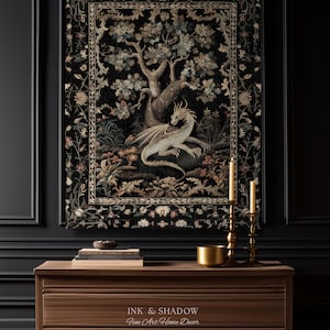 May include: A rectangular wall tapestry featuring a central illustration of a light-colored dragon resting beneath a large tree, surrounded by floral motifs on a black background. The text "INK & SHADOW Fine Art Home Decor" is visible at the bottom.