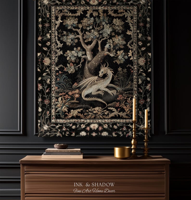 May include: A rectangular wall tapestry featuring a central illustration of a light-colored dragon resting beneath a large tree, surrounded by floral motifs on a black background. The text "INK & SHADOW Fine Art Home Decor" is visible at the bottom.