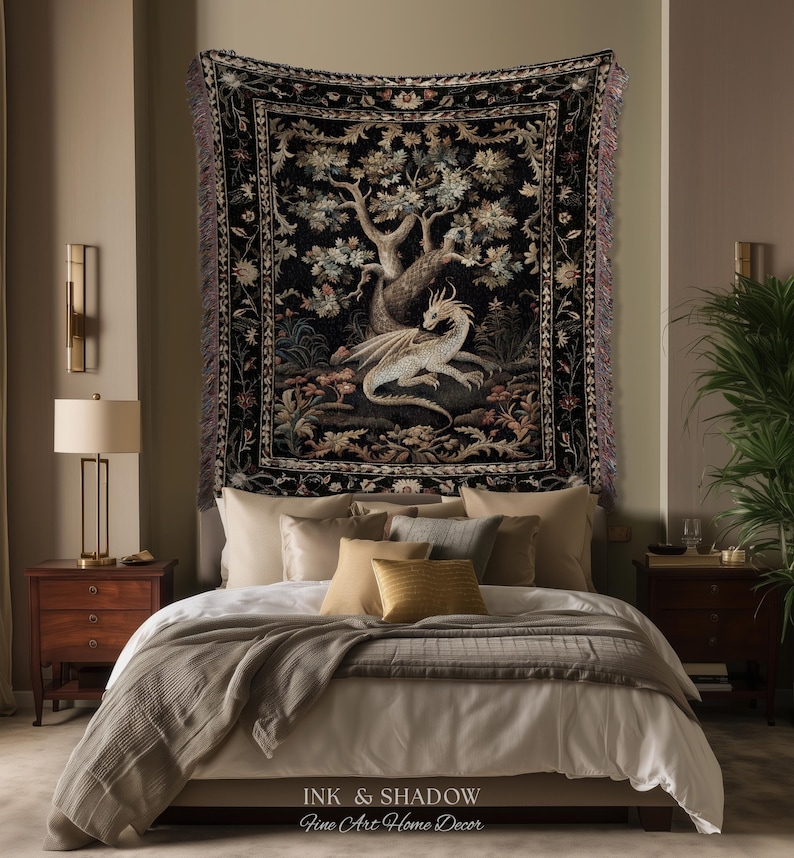 May include: A rectangular woven wall tapestry featuring a central illustration of a white dragon resting beneath a large tree. The design includes a dark black background with intricate floral borders and fringed edges on the sides.