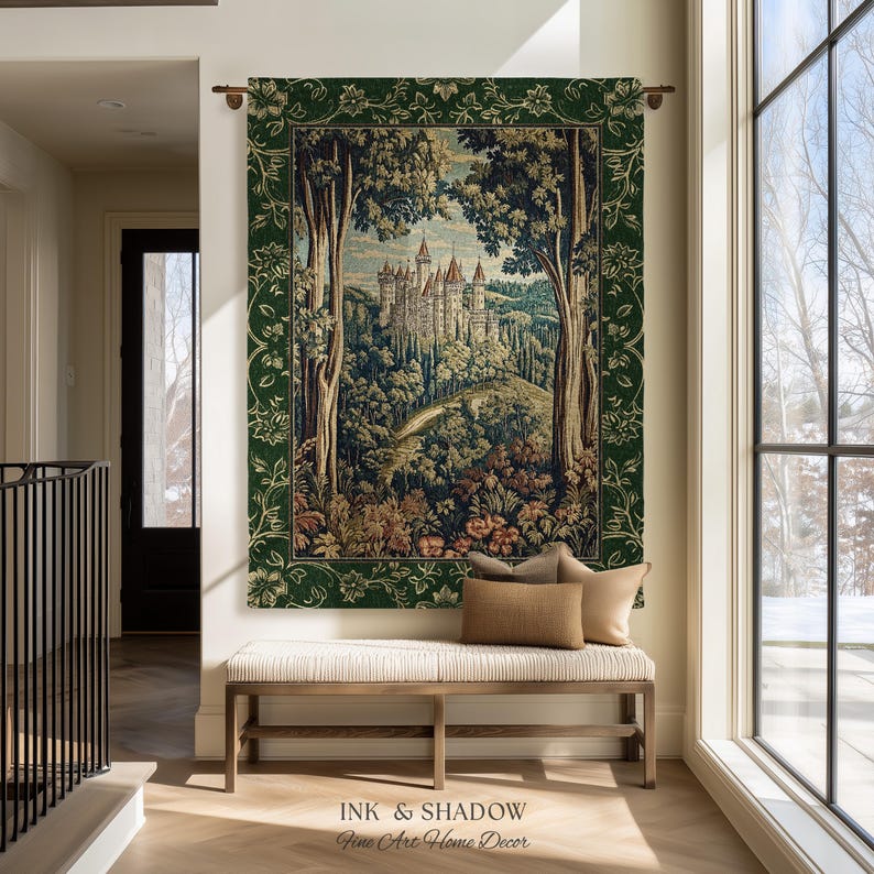 May include: A rectangular wall tapestry featuring a detailed woven scene of a castle nestled in a forest, framed by a dark green border with floral patterns. The tapestry hangs from a metal rod and is displayed above a wooden bench with cushions.