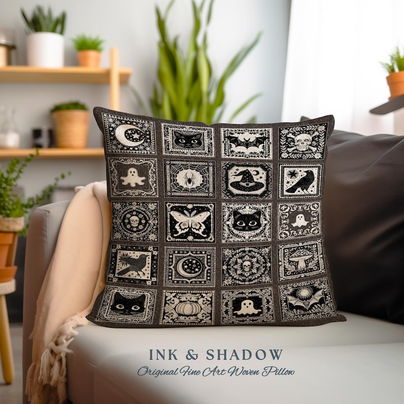 May include: A black and white woven pillow with a patchwork design featuring various Halloween-themed illustrations, including cats, bats, ghosts, spiders, pumpkins, and moons. The pillow has the text "INK & SHADOW Original Fine Art Woven Pillow" printed on the bottom.