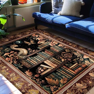 May include: A rectangular area rug with a dark background featuring a fantasy scene with a dragon, bookshelves, and autumn leaves. The rug has a brown floral border and the text "INK & SHADOW Original Fine Art Rugs".