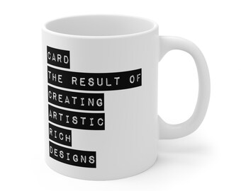 May include: White ceramic mug with black text that reads "CARD THE RESULT OF CREATING ARTISTIC RICH DESIGNS".
