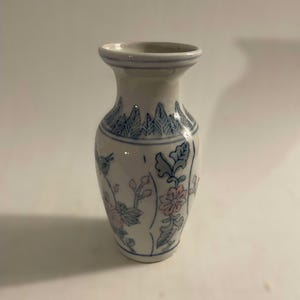 Vintage Chinese porcelain vase with blue, white and pink floral decoration
