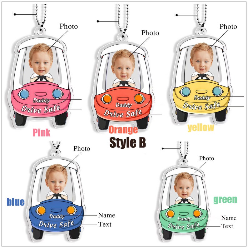 May include: Five different color variations of a car-shaped keychain with a photo of a child in the driver's seat. The keychain says "Daddy Drive Safe" in a circle on the back. The colors are pink, orange, yellow, blue, and green.