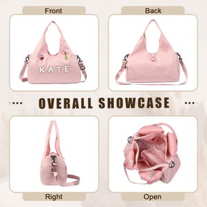 May include: A pink tote bag with a shoulder strap, displayed from various perspectives. The front of the bag features the name "KATE" in white letters, plus heart and lipstick graphics. The bag has several compartments.