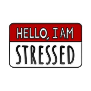May include: A red and white name tag with black text that reads "HELLO, I AM STRESSED".