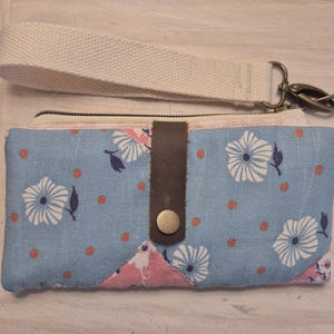 Cartera de muñeca estilo saco de harina vintage con forro de cobre RFID.