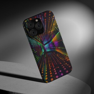 May include: A smartphone case featuring a dark background with a vibrant, multi-colored digital tunnel effect. The design displays rows of glowing orange, yellow, green, and purple dots that create a sense of depth and perspective across the surface.