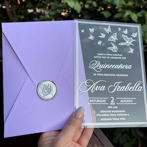 Acrylic quinceanera invitation with butterfly pattern. Lilac envelope with silver seal. Prepared in custom colors and designs of your choice