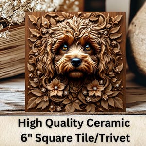 May include: A 6-inch square ceramic tile or trivet featuring a detailed, carved image of a brown dog's face surrounded by floral designs.
