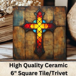 May include: A 6-inch square ceramic tile with a stained glass cross design. The cross is red, yellow, and blue with a wood-grain background.