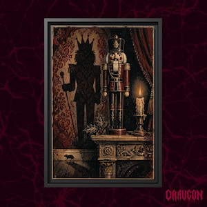 May include: A framed wall art print featuring a nutcracker standing on a mantle next to a lit candle. A large, dark, crowned shadow figure is cast on the patterned wallpaper behind it. A small mouse is visible on the floor near the mantle base.