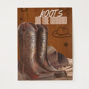 May include: A rustic-themed image featuring a pair of brown cowboy boots with intricate detailing, a cowboy hat, and the text "BOOTS ON THE GROUND." The boots are set against a wooden background with star and horseshoe accents.