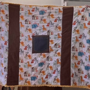 Baby quilted blanket with pocket for treasures