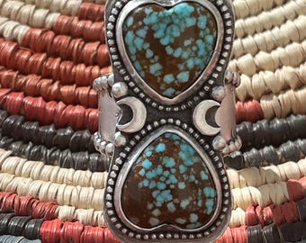 Gorgeous  and rare Number 8 turquoise with dark brown matrix. Heart shaped stones set in sterling. Hand stamped tapered ring band. Size 8.5