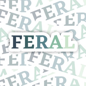 May include: A white sticker with the word "FERAL" in a gradient of blue, green, and light green letters on a white background. The background is covered with the word "FERAL" in various shades of blue and green.