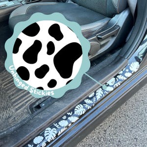 Decalque de carro com estampa de vaca