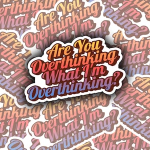 May include: A sticker with the text "Are You Overthinking What I'm Overthinking?" in a gradient of orange, red, and purple. The sticker has a white border and is surrounded by similar stickers.