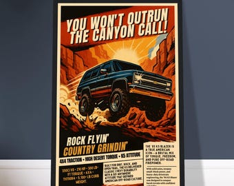May include: A framed poster with a vintage style illustration of a blue and black SUV driving through a desert canyon. Text includes "YOU WON'T OUTRUN THE CANYON CALL!" and "ROCK FLYIN' COUNTRY GRINDIN'" with vehicle specs.