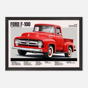 May include: A framed print featuring a red Ford F-100 pickup truck. The image includes technical specifications and the text "FORD F-100" and "Manufactured in the United States". The truck has white-walled tires and chrome accents.