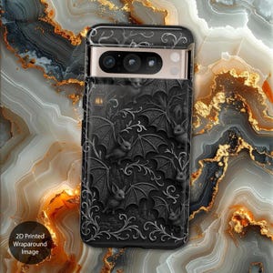 May include: Black phone case with a wraparound design featuring bats, gothic architecture, and ornate vines. The case has a 2D printed image and the text "2D Printed Wraparound Image".
