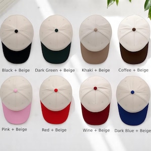 May include: A collection of baseball caps in various color combinations. Each cap features a beige crown and a contrasting-colored brim. The color combinations include black, dark green, khaki, coffee, pink, red, wine, and dark blue. The text on the image indicates the color combinations.