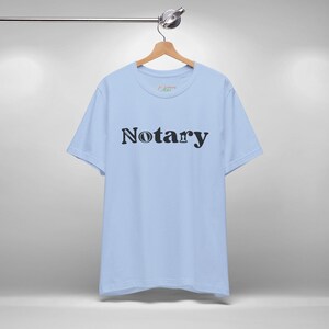 Mobile Notary Tee, Public Notary Short Sleeve T-Shirt, Loan Signing Agent Swag, Apostille Agent Shirt, Paralegal Tee, Unisex Graphic T-Shirt Baby Blue