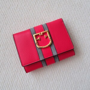 Cartera Furla de cuero con tres pliegues y logotipo