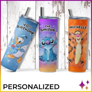 May include: Three personalized stainless steel tumblers with different Disney character designs. The first tumbler is blue with a cartoon image of Donald Duck and the text "40th Birthday". The second tumbler is purple with a cartoon image of Stitch and the text "The Smiths". The third tumbler is orange with a cartoon image of Tigger and the text "Michelle".
