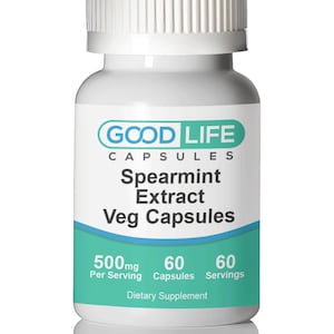 May include: A white bottle with a green label that says "GOOD LIFE CAPSULES Spearmint Extract Veg Capsules 500mg Per Serving 60 Capsules 60 Servings Dietary Supplement"