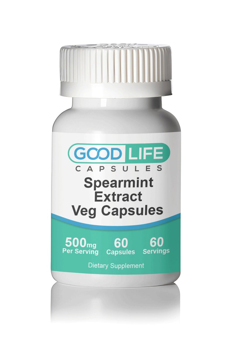 May include: A white bottle with a green label that says "GOOD LIFE CAPSULES Spearmint Extract Veg Capsules 500mg Per Serving 60 Capsules 60 Servings Dietary Supplement"
