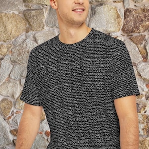 May include: A black t-shirt with a white chainmail pattern.
