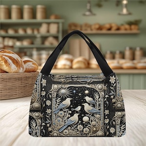 Bolsa de almuerzo portátil. Divertida y original bolsa térmica con diseño de pájaro azul. Ideal para la playa o un picnic. Un regalo ideal.