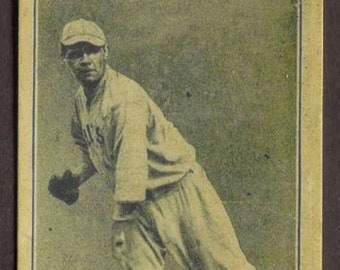 May include: A vintage baseball card featuring a black and white photo of Babe Ruth, a baseball player for the Boston Red Sox. The card has a yellow background with the text "BABE RUTH P. - Boston Red Sox 151" printed at the bottom.