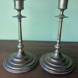 pair of vintage solid brass candleholders
