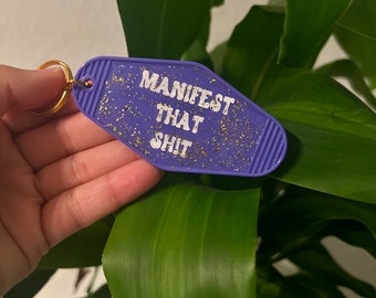 Manifest That Shit Motel Keychain