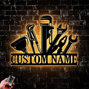 Custom Plumber Tools Metal Wall Art LED Light, Personalized Plumber Name Sign Home Decor, Gifts For Dad, Granddad, Mancave Decor Circle Arts