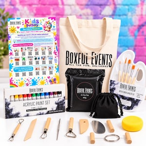 May include: A pottery kit including a canvas tote bag with the text Boxful Events, a 500g pack of air dry clay, a 12-colour acrylic paint set, a white paint palette with five brushes, a black drawstring pouch, and various wooden and metal sculpting tools.