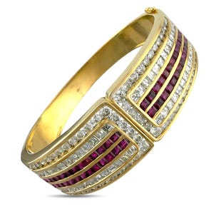 Klapparmband aus 18-karätigem Gelbgold mit 5,20 ct Rubin und 7,02 ct Diamanten