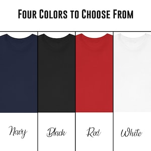 May include: Four t-shirts in different colors: navy, black, red, and white.  The shirts are displayed on a white background.