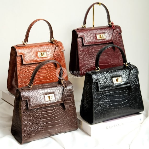 ハンドバッグ Leather handbag with draped details secured by mini varabows 5C69E741-6A4D-4FCE-8269-