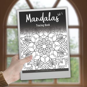 May include: A rectangular tracing book titled Mandalas Vol 1 with a black and white cover featuring a detailed circular mandala pattern. The cover includes the text Mandalas Vol 1, Tracing Book, and the website address www.scribedcontent.com.