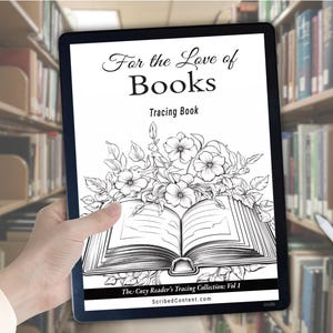 May include: A digital tablet displaying a black and white tracing book cover titled For the Love of Books Tracing Book. The cover features a line art illustration of an open book surrounded by flowers, with the text The Cozy Reader's Tracing Collection: Vol 1 and ScribedContent.com at the bottom.