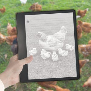 May include: A black e-reader displaying a grayscale image of a hen with five chicks on a lined page. The screen shows the text T&C in the top left corner and the number 58 at the bottom center. The device has a thin black frame and a flat screen.