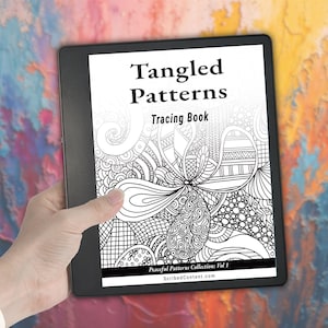 May include: A digital tablet displaying the cover of a book titled Tangled Patterns Tracing Book. The cover features intricate black and white line art patterns, with the text Peaceful Patterns Collection: Vol 1 and ScribedContent.com at the bottom.